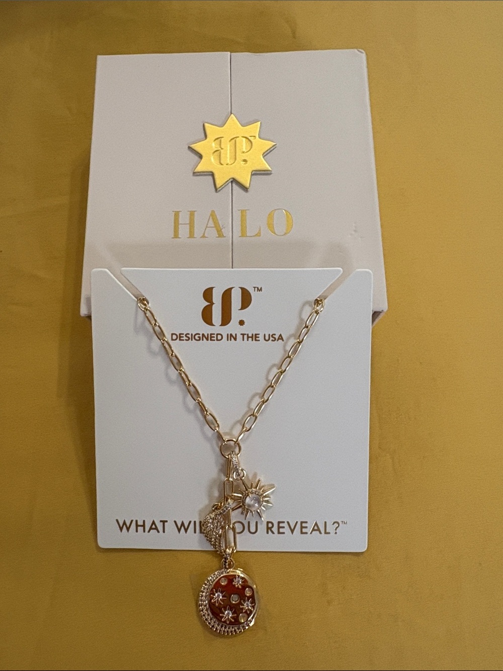Halo Gold-Tone Necklace with Red Enamel Pendant and Star Charms